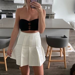 White pleased mini tennis skirt